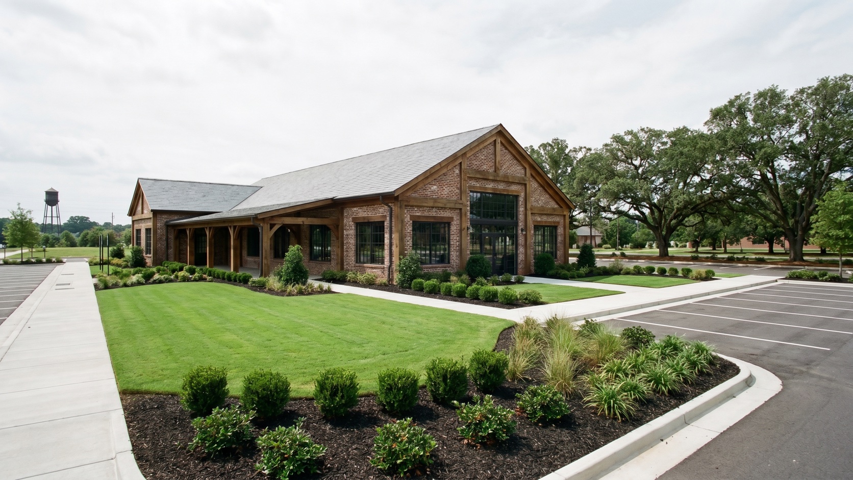 Pristine commercial office exterior with fresh turf edges and dark mulch beds maintained by ManageMowed in the Covington-Conyers area